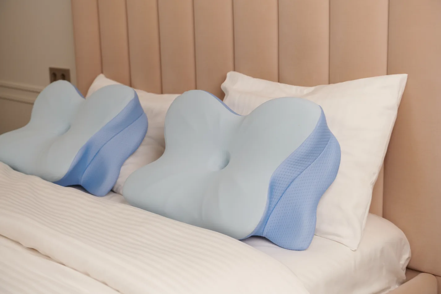 A pillow arranged in an ordinary bedroom setting